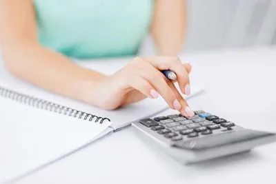 woman calculating her finances