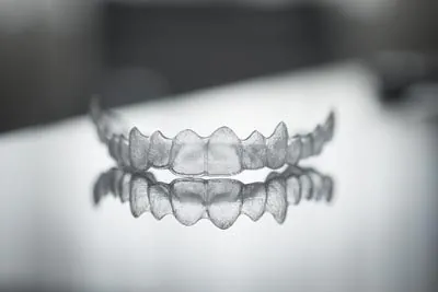 closeup of clear aligners offered at Strawberry Village Dental Care