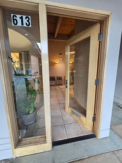 front office door of Strawberry Village Dental Care in Mill Valley, CA